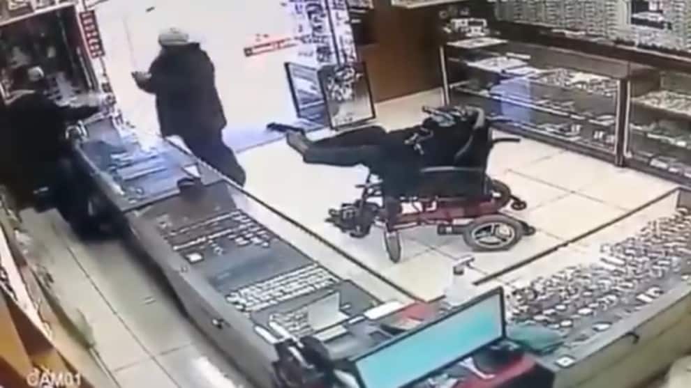 Brazil Robbery Man on Wheelchair