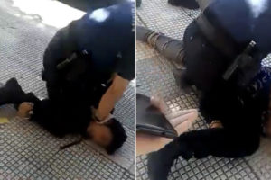Spanish police video kneels on the neck of teenager