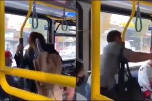 Woman spit vancouver bus Video man shove