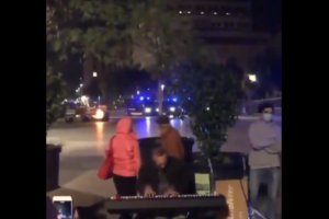 video man playing piano protests Barcelona Spain