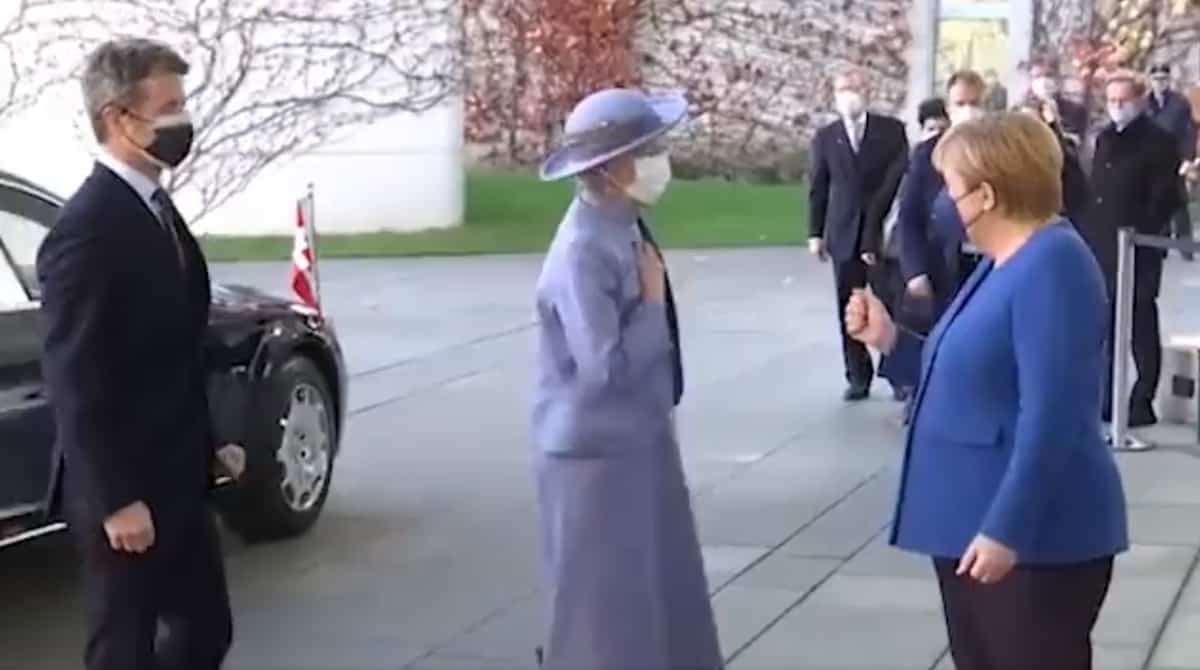 merkel fist bump denmark queen