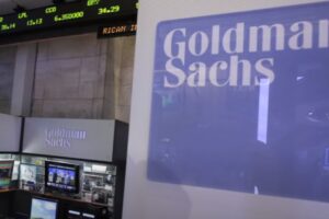 Goldman Sachs Reports Lower Profits, Unveils Reorganization