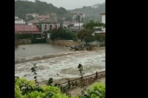 Torrential rains kill one in Greece after wildfires