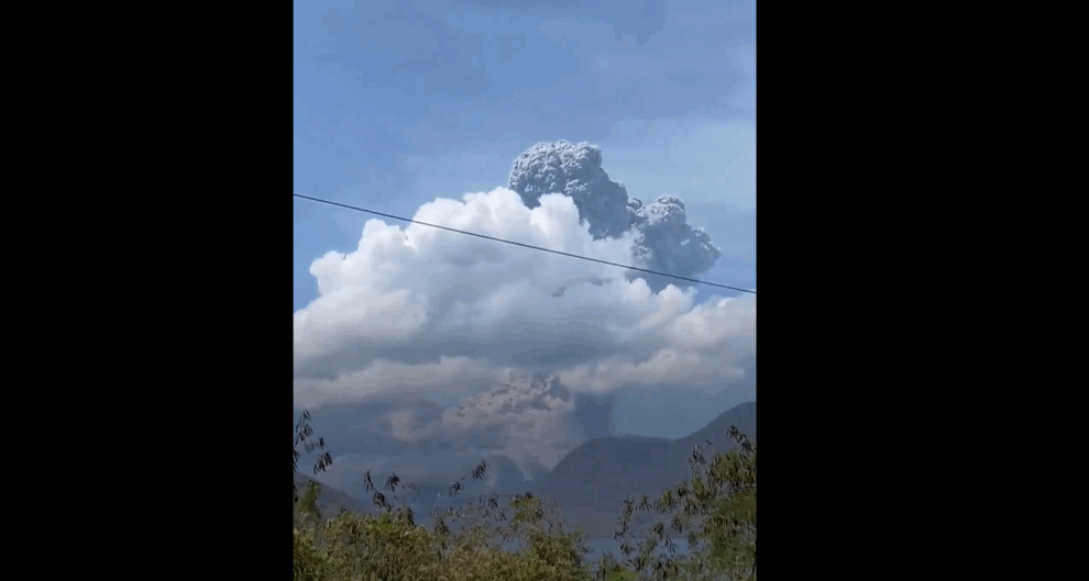 Indonesia volcano erupts, belching ash into night sky