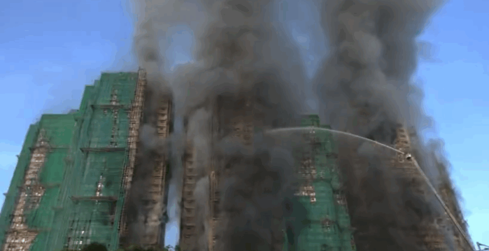 Four dead in Hong Kong housing estate fire: government