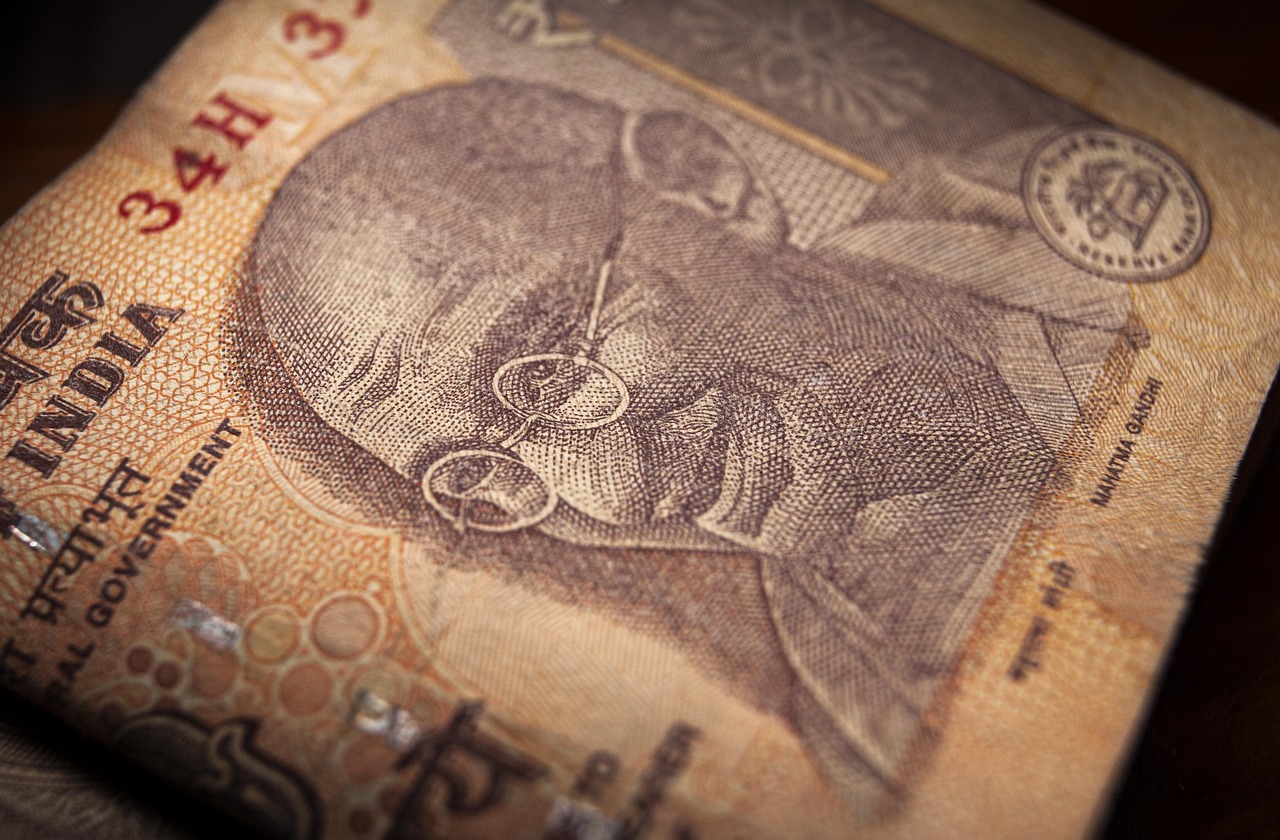 "Indian rupee hits fresh record low past 90 per dollar"