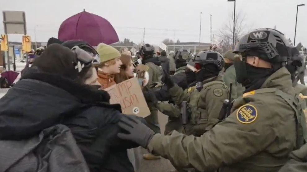 Protesters clash with federal agents in Minneapolis after fatal shooting