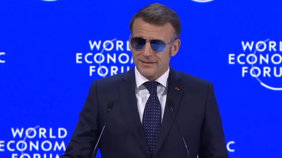 Macron squares up to Trump in rebel shades at macho Davos gathering