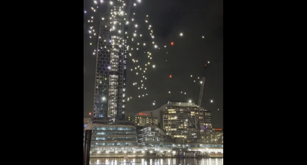 "Sydney light show called off after malfunctioning drones crash into water"