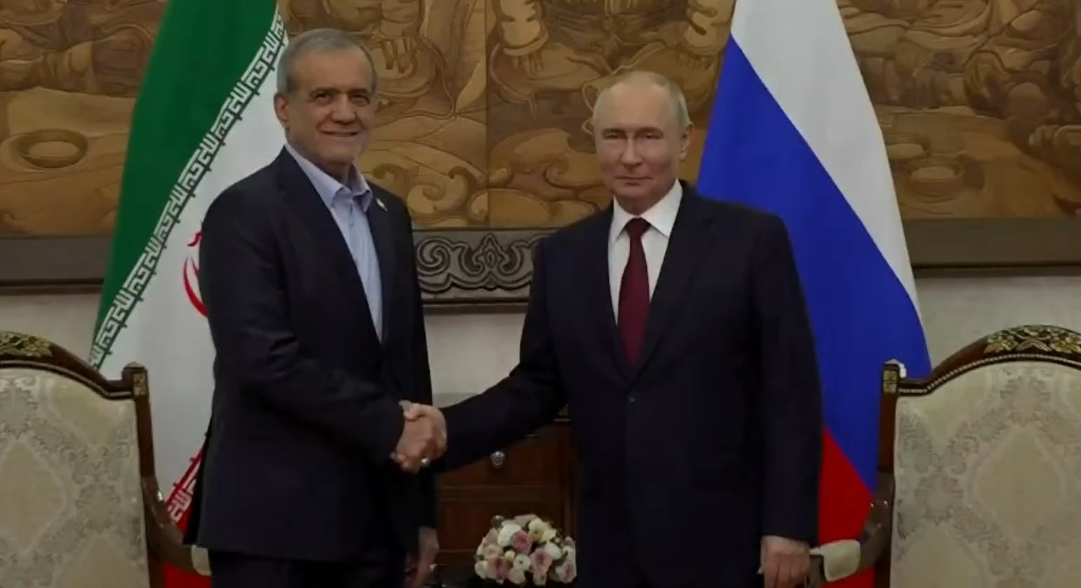 Iran president offers US olive branch, hails Russian support