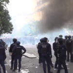 French policeman charged after firing tear gas grenade at high school student: prosecutor